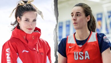 Eileen Gu and Caitlin Clark sit together at Milan Fashion Week