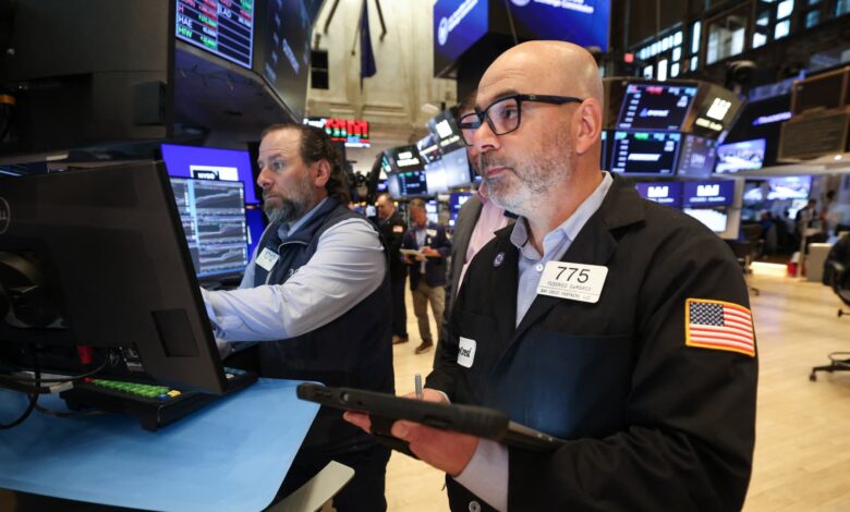 Stocks pull back from records as software drops and oil jumps