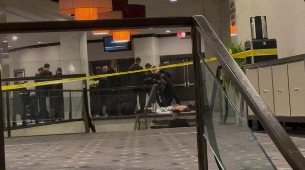 Gunshot at White House Correspondents’ Dinner: Cellphone in vest pocket?