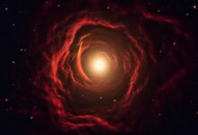 Red monster galaxy found at just 400 million years—how did dust form so fast?