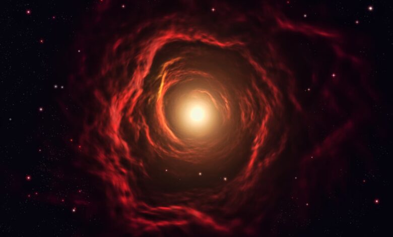 Red monster galaxy found at just 400 million years—how did dust form so fast?