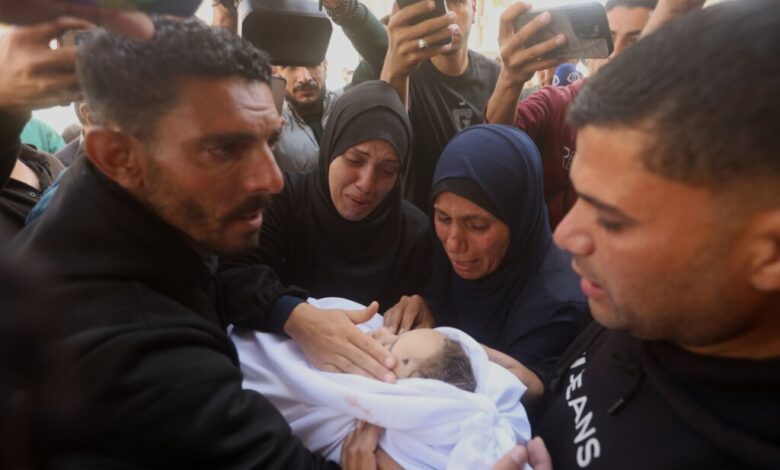 Gaza funerals for pregnant woman and children after Israeli strikes