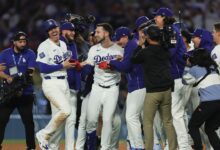 Tucker drives in winning runs as Dodgers rally past Marlins