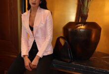 Dua Lipa’s Barbie Bralette Look Pops in Pink Jacket