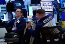 ASX slides lower, NAB slumps on results