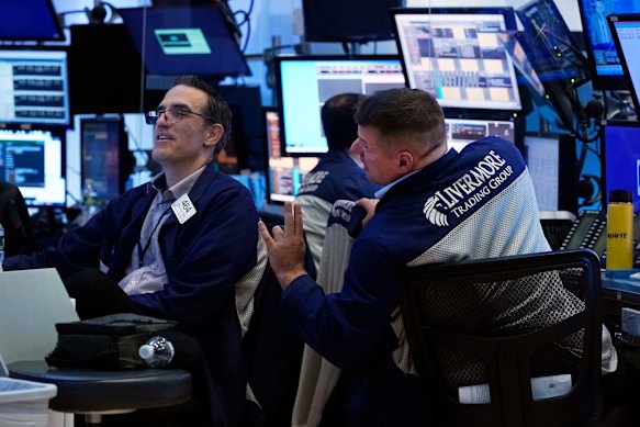 ASX slides lower, NAB slumps on results