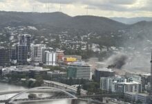 Person rescued from seven-storey building on fire in Brisbane’s inner-west