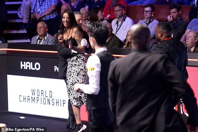 Revealed: World Snooker Championships final intruder identified as OnlyFans star - as she launches online rant claiming she intended to make X-rated gesture in shocking moment