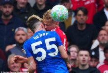 Ex-Premier League star's son is taken to hospital after nasty clash of heads in his first start for Chelsea - as match is delayed for over TEN minutes