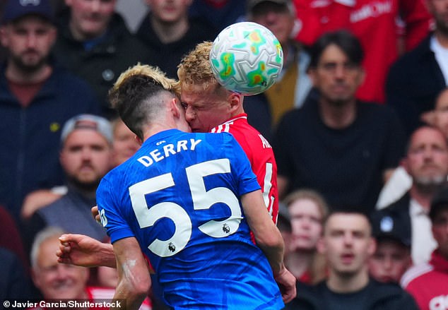 Ex-Premier League star's son is taken to hospital after nasty clash of heads in his first start for Chelsea - as match is delayed for over TEN minutes