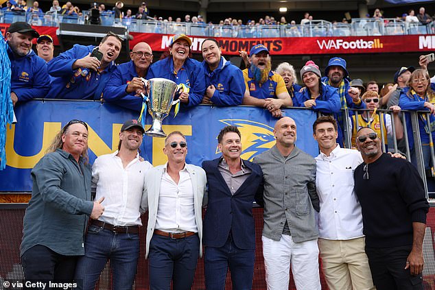 Footy legend with a very chequered past reveals his radically different new look at team reunion