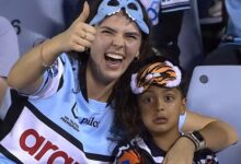 Five-year-old footy fanatic goes viral after being pictured crying his eyes out on TV - as some fans say clip shouldn't have been broadcast