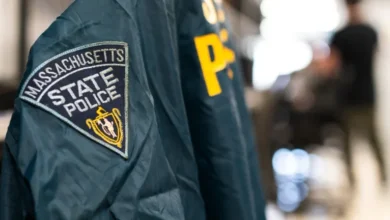 Trooper hurt as cruiser struck on I-93