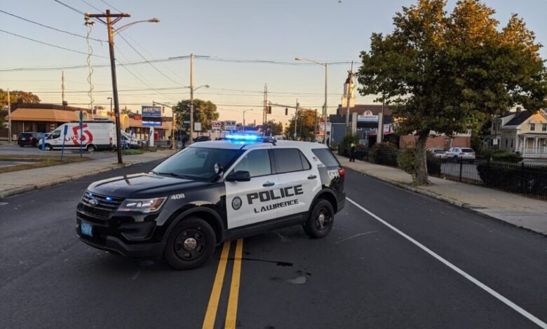 Victims in fatal Lawrence crash both had gunshot wounds, DA says