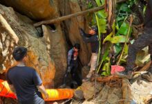 Search in Laos cave stalls as villagers remain unseen