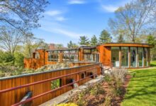 Wayland’s 1970s glass house with indoor pool hits market