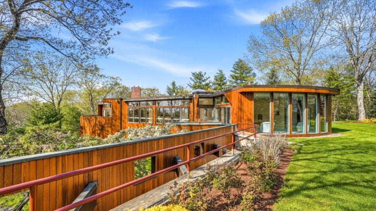 Wayland’s 1970s glass house with indoor pool hits market