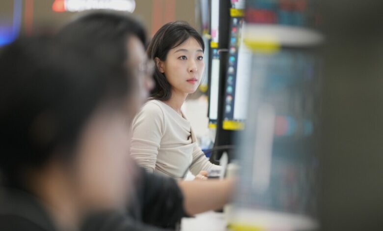 Asian markets are mixed and oil is steady after Wall Street hits records - WTOP News
