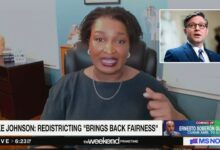 Abrams slams Johnson for celebrating Jim Crow return