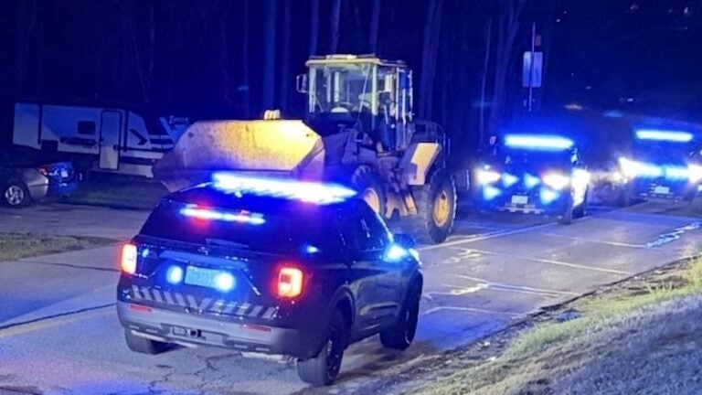 Erratic driver in front-end loader leads police on 10- to 15-mph chase through Mass. town
