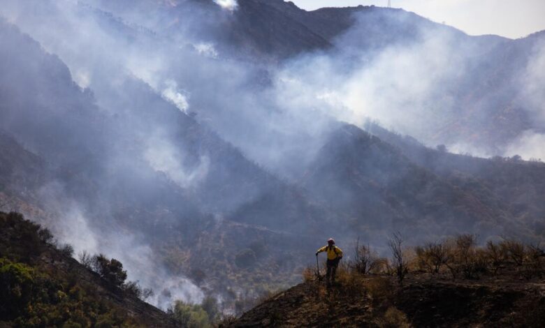 Wind-driven fires burn 20,000 acres as evacuations lift Wind-driven fires burn 20,000 acres as evacuations lift
