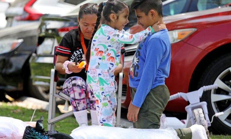 Thousands return as officials keep 16,000 evacuated