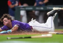 McCarthy’s walkoff triple lifts Rockies past Red Sox