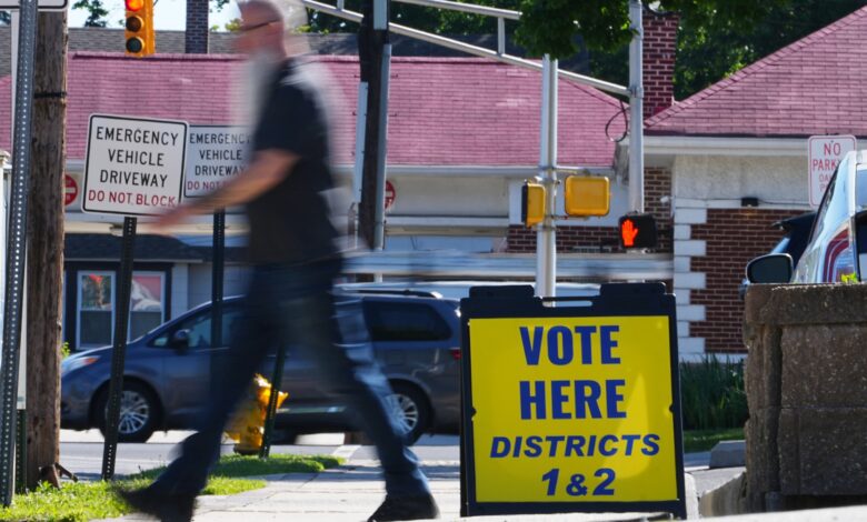Polls open across battleground states as stakes rise