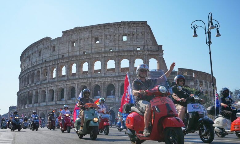 More than 10,000 Vespas flood Rome for 80th