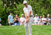 Poston blows lead, then wins Memorial playoff