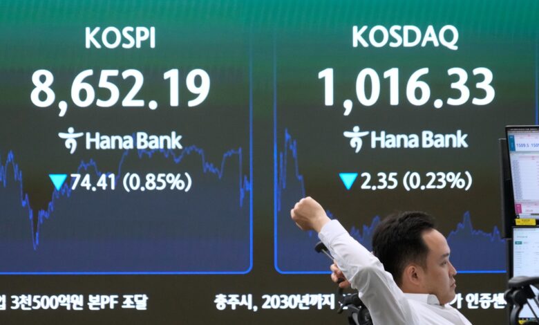 Stocks slide as Fed projections spark rate hike fears
