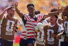 U.S. clinches knockout spot with 2-0 win