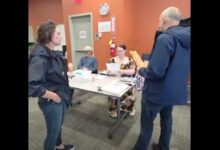 ICE warning at polling place sparks free-speech fight