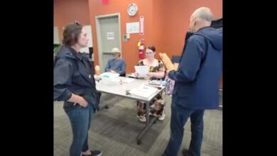 ICE warning at polling place sparks free-speech fight