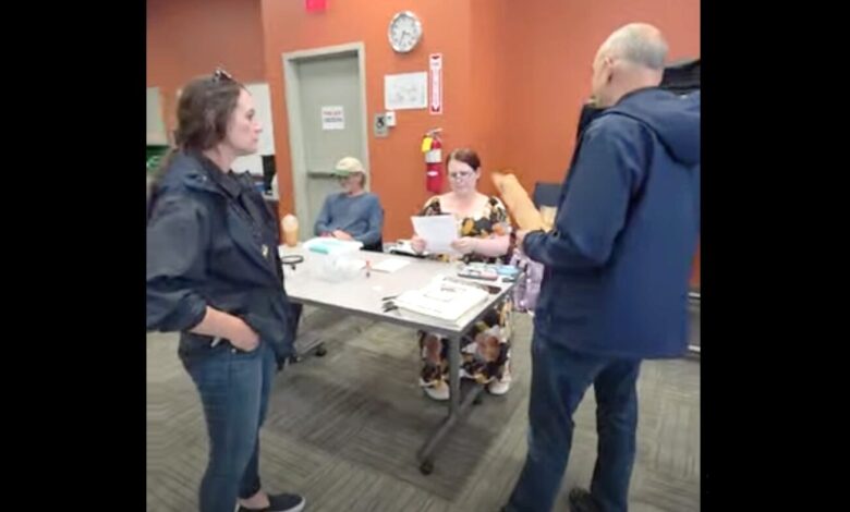 ICE warning at polling place sparks free-speech fight