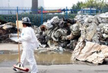 Idling trucks and sandbags signal Boyle Heights cleanup