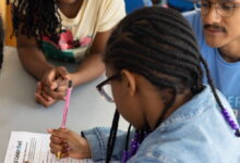 Chicago after-school program uses paper pencils to teach AI
