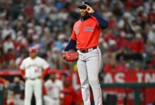 Chapman strikes out record save; Red Sox win 5-2