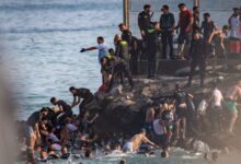 Spain deploys military to Ceuta after thousands of people breach Morocco’s border and at least 9 die