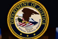Federal prosecutor who was fired over years-old blog posts critical of Trump sues Justice Department