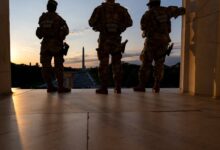 A year in, thousands of armed troops have quietly become a fixture of D.C. life