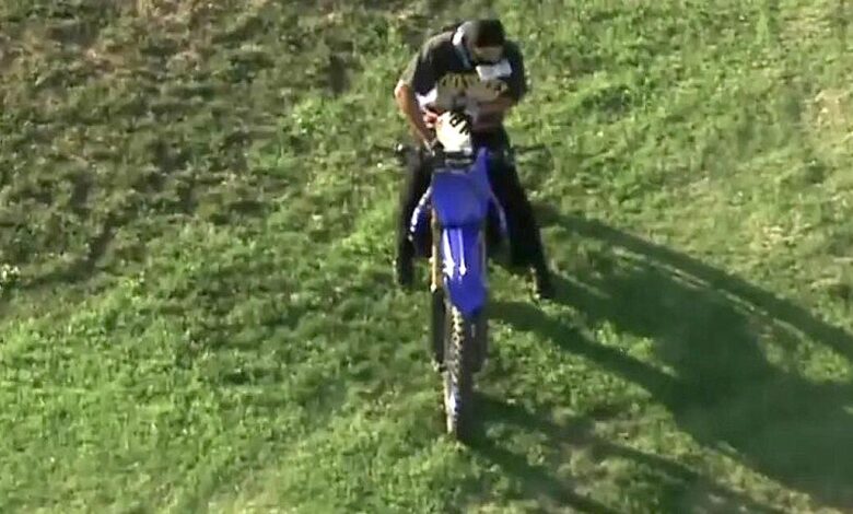 Man on dirt bike leads police on chase through downtown L.A., makes phone call, stops for gas