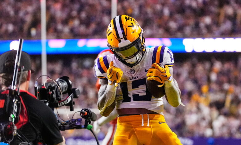 Michigan falls out of AP Top 25 as LSU moves into the top 10 Michigan falls out of AP Top 25 as LSU moves into the top 10