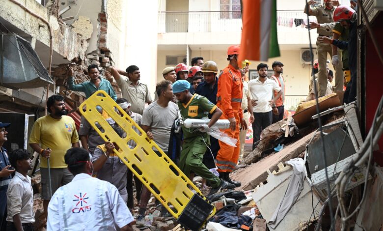 Building collapse in New Delhi kills 1 and traps dozens of others – WTOP News