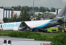 At least 5 dead after Amazon cargo plane barrels off runway at Miami airport